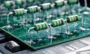 Resistance forming machine performing axial resistor lead cutting and bending